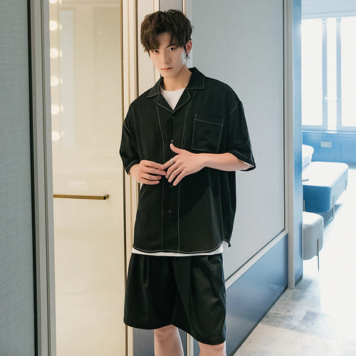 Sicilian men's autumn black short-sleeved shirt male Korean version of the trend five-point sleeve men's loose half-sleeved shirt