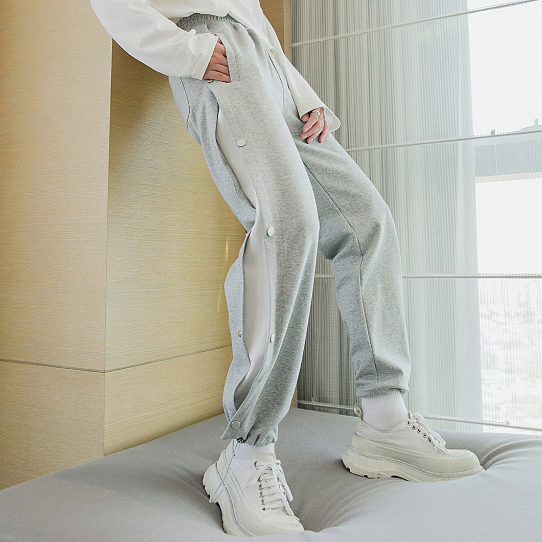Sicilian men's spring new casual pants design sense embroidery letter trousers Korean version of the trend of men's leggings